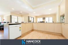 3 Crowd Rd Gelorup WA 6230 $719,000 ULTIMATE LIFESTYLE HAVEN Web property id: 641 Amazing opportunity to secure your ultimate lifestyle dream. Situated on a sprawling 6,700sqm of rural bliss, yet only minutes away from the expanding Dalyellup Shopping Precinct so you get the best of both worlds. A sensational property with monstrous open plan living area, separate theatre room and beautiful added extras such as recessed ceilings, down lights and r/c a/c. The four bedrooms are a great size with either walk in or built in robes and your guests will enjoy spending the weekend, with the spare bedroom having it’s very own ensuite. All year round you can enjoy entertaining outside under the massive fully enclosed patio. Enclosed with floor to ceiling glass panes you can kick back and enjoy the view of the magnificent gardens, all year round. Additional features include a huge 12m x 12m x 3.6m high shed, bore with filter system, rain water tanks and auto retic system.