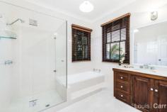 10 Glendale Grove West Pennant Hills NSW 2125 Sandstock Manor - a palatial haven of luxury Welcome to Sandstock Manor, a palatial haven of luxury and custom design that offers the astute entrepreneur an enviable package of absolute comfort, privacy & opulence. Built to meticulous standards, with an elegant gated frontage & manicured gardens, combining urban convenience with estate-like tranquillity. Secure your families investment today, reap the benefits afforded by the 1KM proximity to Cherrybrook Train Station. Set on 1,310m2, on the market by the original owner, it's an outstanding opportunity in a coveted enclave. Immediate access to bus stops for M2 city & local schools, minutes walk to Coonara Village & a plethora of local parks, the epitome of lifestyle convenience! The home offers an unparalleled convergence of luxury and nature. With privacy afforded by opaque vegetation, it provides a sanctuary for contemplation and an exciting space for large scale entertaining with a sequence of outdoor living zones including a sparkling inground pool and cabana as centrepiece. Relax and unwind by poolside level lawns or on the complete wraparound veranda that commands majestic district views or perhaps an outdoor viewing of your favourite film undercover with the in built waterproof flat screen TV. With a double brick ground level, this home encapsulates the art of creating a wonderful balance between form and function. A wealth of sun drenched interiors are designed to take in full views to the outdoor haven. Formal lounge boasts wet bar and open sandstock fireplace; the perfect spot to host cozy indoor gatherings. Other spacious living areas include formal lounge, large rumpus/casual lounge, and versatile sun room/casual lounge with a second fireplace and bay window. The ultra-modern showcase kitchen presents as new and is spectacularly appointed with a diverse range of features including an extensive collection of european stainless steel gas appliances, soft closing drawers, built in wine fridge, dishwasher and waterfall caesarstone benchtops. Accommodation offers the flexibility to suit each family's individual needs housing 5 bedrooms all with built in robes plus a large study/home office or 6th bedroom if required. The master wing encompasses a luxurious en-suite, expansive dressing room, sitting area and balcony access. There are 4 bathrooms in total, 2 fully renovated to the highest specifications with superior contemporary finishes. Special features: *Original Sandstock full brick lower level; upper suspended concrete slab. Keeps the home cool in summer and warm in winter *Ducted reverse cycle air-conditioning *Triple automatic garage with mezzanine storage; granite wet bar, 3m high ceilings *2 sandstock open fireplaces, gas heating points *New carpets throughout, new paintwork *Wrought iron electric gates, galvanised, painted & powder coated, outdoor tv *Intercom system, terracotta roof tiles *5 stage watering system, new gutters