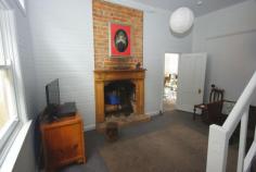 72 Princes Hwy Cobargo NSW 2550 $295,000 Positioned in the main street of Cobargo is this historic shop c1895, residence and studio. The residence features three bedrooms, balcony overlooking Cobargo's main street, bathroom and open fire. The shop is fitted out with good sized kitchen, rear deck for entertaining, large yard and established gardens. The studio is open plan in a private setting at the rear of the premises. Ideal for a teenage retreat. The shop and residence is ideal for those who are waiting to live and work from home. Tourist traffic ensures there is plenty of passing trade. Cobargo is a popular stop for the travelers with plenty of curio shops, cafe's, hotel, bakery and news agency. Features Balcony Verandah Property Details Bedrooms 3 Bathrooms 1