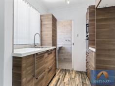 26/56 Speed Street Liverpool NSW 2170 $380,000 - $420,000 By far one of the nicest top floor units Infiniti Property has seen, this property has had a gorgeous interior redevelopment encompassing a modern contemporary style tailored to the needs of any buyer with its low maintenance Italian & Spanish wall and floor tiles to the luscious European kitchen with stainless European appliances. Its location is on par Sydney's best for its centrality, affordability and its guaranteed future growth being the South Western Sydney growth center, the enormous multiple billion dollar upgrade of Liverpool and its immediate surrounding suburbs will pave the way for Liverpool's economic, social and population surge making it the "go-to" area to park your money in. Drawing attention to: + 2 beautiful, good sized bedrooms with brand new mirrored built-ins & good quality hard wearing underlay/carpet + A kitchen to die for, dressed in the latest colours, Made in Europe appliances, built-in oven/microwave with induction cook-top and booster, cabinetry highlighting Blum soft close door/drawer hardware, 40mm engineered stone benches by Quantum Quartz, kitchen comes with a 25 year manufacturers guarantee. + An absolute luscious bathroom, European tiles from floor to ceiling, frame-less shower panel, wall-hung vanity, exhaust fan/LED lighting and exquisite bathroom accessories sure to create that wow factor + Tiled floor to ceiling internal laundry with wall hung 40mm stone bench, polished chrome tap-ware and premium 1/4 turn taps for washing machine + Combined living/dining and kitchen areas with Italian floor board look tiles through-out + Brand new Kresta rubber backed vertical blinds in neutral white, bring your own furniture and don't worry whether it will match the decor, blinds have a 10 year guarantee + Low energy consuming down-lights through-out, save on electricity bills & globes + An addition of a linen press with plenty of storage + Hot water system has an electronic water leak detector that shuts off supply of water in the event of a leak + Brand new sliding door to balcony + 2.5HP Samsung inverter split system air conditioner with very quiet compressor and "follow me" function, plenty of power to cool the unit and provide comfortable living conditions in the Australian summer + Rewired electrical switchboard with RCD and MCB safety switches + Painted & tiled balcony overlooking an exciting yet serene back drop + High speed NBN broadband & Pay/Satellite TV equipped + Large 1.5 car lock-up garage + All this within walking distance to Liverpool station and Liverpool CBD, shopping, schooling and child-care Property details: + Building age: Approximately 35 - 45 years old + Construction: Double brick + Quality of Construction: Good + Total floor space: 80m2 incl. balcony & garage Rent & Levies: + Prospective rental: $370 / week + Strata levies: $470 / quarterly + Council: $260 / quarterly + Water: $170 / quarterly Suburb Information: + Child Care: Minutes walk/drive + Warwick Farm Station: 800m + Liverpool Train Station: 1km + All Saints Catholic Colleges: 450m + Liverpool Boys/Girls High School: 300m + Al Amanah College - 1.8km + Tafe Liverpool - 1km + Liverpool CBD - 500m + UWS Bankstown - 8.2km + Whitlam Leisure Centre - 2.1km + Hart Park - 550m (Basketball Court, gym/exercise set/childrens play sets/areas) + Chipping Norton Lakes - 3km Property Details Bedrooms 2 Bathrooms 1 Garages 1 Floor Area 80 m2