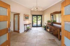293 Stevens Rd Witchcliffe WA 6286 $1,595,000 Luxurious Estate 4 3 16 15 acre (approx) This magnificent homestead is set on 14 acres of undulating parkland right in the heart of the Margaret River wine region. The custom designed home makes the most of the north facing aspect and has been thoughtfully planned to make best use of its solar passive aspect. Designed in two living wings with a connecting foyer, the enormous open plan living/kitchen/dining wing comprises a modern well appointed kitchen, expansive sandstone tiled flooring and view capturing doors which open onto the large covered outdoor deck that soaks in the tranquil atmosphere of the landscaped gardens complete with lily pond. Conduct business from home with ease as there is a separate study located adjacent to the entrance door. The bedroom wing is cleverly designed with three double size bedrooms surrounding a second loungeroom that also overlooks the gardens and opens directly onto the north facing verandah. The main bedroom has the indulgence of a walk through robe that leads into a sumptuous ensuite. A second bathroom and separate WC (complete with exterior vanity) is located closer to the remaining bedrooms. Modern stylish tiling, carpeting and fixtures and fittings are evident throughout the entire home and provide a sense of luxury and comfort. If this luxurious home isn't enough for the family, there is a modest cottage located in the valley of the property. Nestled amongst trees, this accommodation would be the ideal pad for the teenager or extended family or rent out to paying tenants, as it consists of a bedroom, open plan living and a bathroom. A spacious elevated deck leading out from the living area overlooks lush lawns and a picturesque spring fed 50m x 40m x 3m deep dam. A large 17.5m x 7.5m powered colourbond shed with concrete floor to two bays is situated between the main house and cottage and provides ample space to store all of the equipment. An area of this shed has been decked out into a games room/living quarters, providing even more space for the kids and extended family. Abutting Leeuwin Estate and neighbouring Voyager Estate wineries, only 9 kilometres from the Margaret River townsite and only 6 kilometres from the coast, live in luxury on the land knowing that the conveniences of town are only a short drive away and the beauty of the region is all at your doorstep.