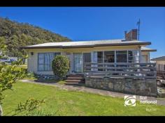 4 George St Chasm Creek TAS 7321 $184,500 Guaranteed Rental Return from Day of Settlement 3 1 650 sqm (approx) Fantastic investment properties with virtually guaranteed rental demand sound too good to be true. Not this gem just a few minutes’ drive from Burnie. This three bedroom weatherboard property needs some work but its' location, water views and near level block more than compensate. The property has an enviable rental history with the same tenants residing in the property since 2011 and an excellent return on investment at $255 per week. It is a single level three bedroom home. There is a veranda at the front entrance, a great spot in the morning to sit and enjoy plus a deck at the back. There is a large homely lounge room with electric heating, kitchen with dishwasher, dining area with wood heating, sunroom and rumpus/family room. Nice water views from the sunroom, a great backyard for kids to safely run around and explore plus off street parking for up to 3 cars. It really is a very peaceful and pleasant location. Located in an affordable area and great neighbourhood, your dreams of purchasing into today's market can be realised right here.