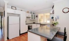63 Vost Dr Sanctuary Point NSW 2540 $485,000 IT'S ALL DONE - JUST UNPACK Built with retirement in mind, but also suitable for families this home has many features that will allow you to just move in, unpack and relax. With plenty of room for the caravan, boat and a few cars. Three spacious bedrooms, two bathrooms. Private lounge room, open plan living/dining. Well equipped kitchen with breakfast bar. Huge covered all weather patio/bbq area. Extended garage depth, suit large car or boat. Reverse cycle air-conditioning, solar power. Side access, parking bay for van/motorhome. Fully landscaped yards with lush green lawns. Veggie patches and handy garden shed. 683m2 block, backs reserve, tranquil outlook.