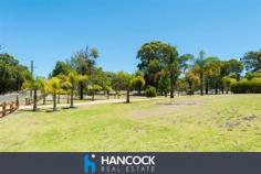3 Crowd Rd Gelorup WA 6230 $719,000 ULTIMATE LIFESTYLE HAVEN Web property id: 641 Amazing opportunity to secure your ultimate lifestyle dream. Situated on a sprawling 6,700sqm of rural bliss, yet only minutes away from the expanding Dalyellup Shopping Precinct so you get the best of both worlds. A sensational property with monstrous open plan living area, separate theatre room and beautiful added extras such as recessed ceilings, down lights and r/c a/c. The four bedrooms are a great size with either walk in or built in robes and your guests will enjoy spending the weekend, with the spare bedroom having it’s very own ensuite. All year round you can enjoy entertaining outside under the massive fully enclosed patio. Enclosed with floor to ceiling glass panes you can kick back and enjoy the view of the magnificent gardens, all year round. Additional features include a huge 12m x 12m x 3.6m high shed, bore with filter system, rain water tanks and auto retic system.