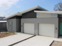 1/66 Armidale Street Abermain NSW 2326 $330 weekly BRAND NEW 2 BEDROOM VILLA READY SOON Located in a quite street with only a short walk to the local primary school, petrol station and not too far from town this brand new 2 bedroom villa could be yours including... 2 bedrooms with stainless steel ceiling fans, the main bedroom with a walk in robe and ensuite and the second bedroom with a built in robe. The kitchen with stainless steel appliances, double stainless steel sink, breakfast bar, plenty of cupboard space including a pantry opens up into the large dining area and flows into the separate carpeted lounge/family room, both rooms with ceiling fans and sliding door access to the concreted courtyard. There is a full size bath with included shower area in the main bathroom, vanity and toilet with wall to floor dark tiles featuring over the bath which extends the high ceilings even further. With a remote single car garage and landscaped easy care gardens and courtyard this very stylish villa could be yours, be the first tenants to move into this low maintenance property which is available early to mid December! Enquire today! VILLA FEATURES GENERAL FEATURES Bedroom: 2Bathrooms: 2 (Ensuites: 1) Garaging: 1 ( remote access )Fully Fenced EXTERNAL FEATURES Courtyard