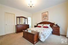 7 Noosa Ct Seaford Rise SA 5169 $429,000 Full of light with space for all 4 2 2 600 sqm (approx) Welcome to 7 Noosa Court, Seaford Rise. The owners have arrived at the decision to downsize and are serious about selling. Considering past sales in the highly sought after Coast Estate, Seaford Rise, and the quality attributes of this fantastic property, we consider that the listed price is a good starting point for conversation. Five minutes away from the mid coast’s best beaches, this vibrant family home is nestled into the sought-after hilltops of Seaford Rise. The home showcases a modern four-bedroom, three living room design, built upon the renowned Hickinbotham’s ‘Coventry Spa’ plan providing 253m2 of quality lifestyle. The generous master bedroom and formal dining/lounge area dominate the lower level, providing an independent retreat from the key shared spaces for the grown-ups. Stepping up five tiled stairs delivers you into a generous family space, with open plan living, kitchen dining, and independent games room / home cinema. You will also find three further good sized bedrooms (all with built in robes), a family bathroom with tub, and laundry on this level. Following the principles of comfort and simplicity, the home also comes with nine foot ceilings, automatic roller doors for the two-car garage (one with a drive through bay) and a low-maintenance garden (600m2 block) featuring quality lawns and hedging shrubs to provide privacy to the rear yard. The amenities shortlist is completed by NBN connection to the home and reverse-cycle ducted air conditioning throughout. The release of this fantastic home provides a great solution for a growing family searching for the sacred balance between vibrant outdoor activities and a comfortable indoors life. Internal Features: General features: * 253m2 of quality living based upon the popular Hickinbotham ‘Coventry Spa’ design. * Split level (5 stairs up) separating formal living and master bedroom from family spaces and secondary bedrooms. * 9 foot ceilings throughout. * Ducted Fujitsu reverse cycle air conditioning throughout. * Quality low plush carpet through bedrooms and formal living spaces, with Italian tile throughout kitchen and high traffic family spaces. * NBN to the home (not to the node). * Security screens on front and back doors. * Quality décor with neutral tones. Lower level: * Large (3.5 x 8m) formal lounge and dining room with bay window, ducted air, ceiling fans and quality curtains. * Coffered ceilings distinguish distinct dining and lounge spaces. * Master bedroom with quality curtains, large walk in robe and modern ensuite bathroom with spa–tub. * Tiled entrance area and wide passage way to 5 step stairwell leading to upper level. Upper level: * Modern colonial kitchen with laminate benches, generous storage space, double sink, walk in pantry, Westinghouse gas hob and oven, and quality LG dishwasher. * Open plan, tiled family space providing informal dining and lounge. * Separate third internal family space (4.1 x 4.3m) employed as rumpus / games room or home cinema. * Sliding doors connecting family space and kitchen to large paved alfresco dining area. * Discrete passage containing generous built in linen press /storage cupboard, leading to remaining bedrooms, family bathroom and laundry. * Three large (~11m2) bedrooms all containing built in robes, ducted air and ceiling fans, and large windows providing plenty of natural light. * Three way family bathroom with separate powder room with built in storage, toilet and bathroom with shower and bath-tub. * Generous laundry with built in storage. External features: * 600m2 (20 x 30m) block with 20m street frontage. * Quality brick build with tiled roof. * Terraced front yard with native ornamentals and roses. * Two car automatic roller door garage, one bay with drive through to back garden via adjacent third roller door. * Quality paved paths girdle home. * Rear gardens with L-shaped lawn and raised edging beds containing hedging ornamentals. * 3 x 4m garden shed. * Open views of the Seaford wetlands provides strong feeling of space. * Paved alfresco dining area (6 x 10m) and sunken BBQ area (4 x 6m) to rear or garage. * Secure 5.5ft colourbond fencing provide privacy and security. * Insta-heat gas hot water service. Location: Five minutes to - shopping facilities, including Moana Heights and Seaford shopping centres. - Seaford Train Station and the start of the Southern Expressway, providing access to the Adelaide CBD within 40 minutes. - the internationally renowned McLaren Vale winemaking region, with its cellar doors, restaurants and cafes. - some of Adelaide’s best beaches, including Moana and Maslins, as well as the surf breaks of the mid coast. - the coast to vines bike/walking trail. Additional information Property Type House Property ID 11324100937 Street Address 7 Noosa Court Suburb Seaford Rise Postcode 5169 Price $429,000 Auction (unless sold prior) Land Area 600 sqm (approx) Auction Time Sat 20 Feb, 11:00am