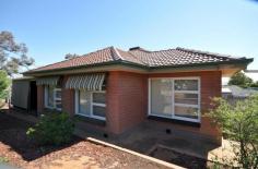 13 Paringa Rd Port Augusta SA 5700 $173,000 CENTRAL LOCATION 3 1 2 Three bedroom brick veneer home with tiled Terra cotta roof built in 1969. 117m2 in size and situated on a decent corner block totaling 881m2. Good central location within close proximity to the Hospital, Primary school and CBD. Other features include ducted evaporative air conditioning, good size lounge with split system air-conditioner, ceiling fans to all bedrooms, neat and tidy original bathroom with separate shower/bath and an upgraded kitchen with plenty of cupboard and bench space. Externally there is awnings on all front windows a back veranda with private screen, single garage and relatively low maintenance garden. The property is fitted with a smoke alarm. Additional information Property Type House Property ID 11735100290 Street Address 13 Paringa Avenue Suburb Port Augusta Postcode 5700 Price $173,000