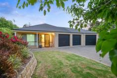 25 Kernick Ave Willunga SA 5172 $589,000 - $609,000 Inspection by Appointment 4 2 4 1,049 sqm (approx) Family living in Willunga Just a short walk from historic Willunga’s main street is this very private home set back from the street in a quiet cul-de-sac, on a very generous 1049sqm block full of native hedges, green lawns and garden beds. Built in 1999, the large 230m2 brick home features two separate living spaces, a formal lounge and a fantastic ‘L-shaped’ family room, featuring colonial kitchen, formal dining and a great lounge with cutting edge home cinema facilities. The master bedroom is of generous size, with walk in robe and modern ensuite, and bedrooms 2, 3 and 4 offer plenty of space, two with fitted, built-in robes. Beautifully integrated with the family room via two sets of sliding doors, a huge all weather outdoor dining area adds a third family space to the home. The back garden has a great lawn, a number of well-established garden beds, as well as a greenhouse, all under an irrigation system that can be controlled from your smartphone. The rear yard backs onto a council curated walking trail, with privacy provided by a border of hedged olives. A fantastic three separate roller door garages can be accessed from the driveway, with one offering a drive through roller door to allow access to the back garden and the large shed (6 x 8m) partitioned to provide a 4th secure garage for boat or caravan. The home is tiled throughout, with low pile carpets within the formal lounge and bedrooms. Ducted reverse cycle air conditioning and ceiling fans control the climate, NBN has been installed to future proof the home, and a 3.5kW solar system offsets your carbon footprint and electrical bills. The rental market is begging for properties like these in the area, so be sure not to miss out on this one - either for your family, or for your portfolio. INTERNAL FEATURES: * 230sqm of quality living. * Broad tiled entrance hall with lockable access to double garage. * Large formal lounge (3 x 5m) with French doors to central hallway overlooking rear gardens. * Huge ‘L-shaped’ family space with open colonial kitchen, dining and lounge. * Modern home cinema system with ceiling mounted speakers made by Krix and a 115” retractable screen with a JVC 3D high definition projector. * NBN fibre direct to home. * Modern kitchen with laminate benchtops, great storage and quality appliances including Bosch oven, Westinghouse dishwasher and hob, and deep double sink with filter-tap. * Master bedroom with generous walk in robe and ensuite. * Three further bedrooms, two with fitted built-in robes. * Ceiling fans and ducted air in all bedrooms * Large laundry with generous built in storage and room for second refrigerator. * Modern family bathroom with tub and separate toilet. * 3 Phase Australian-made Actron reverse cycle air conditioning system ducted throughout. * Bosch motion security system supplemented by Logitech outdoor security camera system than can be viewed in real time on either iOS or Android smartphone. * As new low pile carpeting throughout bedrooms and formal lounge. * Quality floor tiles through shared spaces. EXTERNAL FEATURES: * Generous 1049m2 block on a quiet cul-de-sac. * Attractive front garden with lawn, native hedging and well established ornamental pear providing privacy. * Broad paved driveway to three garages. * Double automatic roller door garage with lockable access into the home via hallway. * Single automatic roller door garage with lockable door access to rear yard, and rear roller door access to back garden to allow drive through. * Attractive rear yard with expansive lawn, back-lit garden beds and established trees. * Automated pop up irrigation throughout lawn and garden beds with Hydrawise wifi irrigation system for smartphone control. * Power outlets throughout garden beds supporting ambience lighting. * Native hedging creating a number of distinct garden spaces. * Rear boundary backs onto council walking trail, with irrigated and back-lit olive tree hedging providing privacy. * Irrigated greenhouse (3 x 5m) and covered seedling bed (1 x 2m). * Two tool sheds (1.5 x 3.5m and 2 x 4m). * An array of well-established fruit trees (citrus, apple, plum, stone-fruit, pomegranate). * 1000L rainwater tank plumbed to garden. * Large undercover outdoor paved dining area (5 x 7m) with pitched roof, integrated with family room via dual sliding doors. * Small pump based fountain/goldfish pool in outdoor dining area. * Colourbond veranda to rear and side providing shaded pathway around the rear of the house. * Large work shed (6 x 8m) with three phase power, partitioned to allow for secure vehicle storage (fourth garage). * 3.5kW solar system with quality SMA Sunny Boy inverter. * Five minute walk to Willunga Hill street. * Strong rental market in area. Additional information Property Type House Property ID 11324100928 Street Address 25 Kernick Avenue Suburb Willunga Postcode 5172 Price $589,000 - $609,000 Land Area 1,049 sqm (approx)