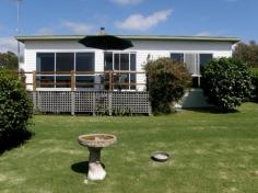 18 Sunbeam Cres Beaumaris TAS 7215 $230,000 Affordable Seaside Home End the search for the ideal holiday retreat or retirement home with this neat and tidy seaside cottage, perfectly situated in a quiet coastal cul de sac. The property, consisting of an immaculate dwelling on approx. 754 m2 level land is located in the popular north east hamlet of Beaumaris. It is within a pleasant 10 minute drive to St Helens and is a short stroll from Beaumaris surfing beach. Accommodation includes 3 well proportioned bedrooms, sunny bathroom with separate toilet, formal dining room and large living room which opens onto a north east facing deck where glimpses of the Tasman Sea can be enjoyed. Complimenting the attractive interiors is a well appointed kitchen which overlooks the light filled living zone. The lock up garage has internal access to the interior while a separate garage / workshop is ideal extra vehicle accommodation. Established and beautifully manicured gardens enhance the relaxed ambience of this charming home. Reward Yourself this Summer Because Life is Better Beside the Sea. General Features Property Type: House Bedrooms: 3 Bathrooms: 1