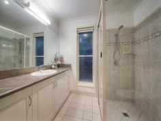 19 Callaghan Dr Taranganba QLD 4703 $620,000 PRICE DROP...Take a sencond look, This is a MUST see It would be easy to appreciate the very workable traditional kitchen in this home, then when its time to eat, sit in the dining room and look over the pool area through the roof to floor windows which surround the dining table. A great place to sit and take in the sun when it starts getting a bit nippy. With 2 living rooms being in separate areas of the home means a couple of beers and the footy can be on the TV in one room and a chocolate, bag of popcorn and a good movie on the TV in the other. There are 4 generous sized bedrooms, 2 of which are classed as main bedrooms with an en-suite off each. The main bedrooms are at either end of the home which makes it easy for everyone to have their own space. There is also a main bathroom for the other 2 bedrooms of which could both fit a queen bedroom suite. Invite the family or friends over for a barbie, sit around under the covered area and chat all while having the feel of being in your own private hideaway. Take a dip in the pool and if its too cold hop under the outdoor heated shower to warm up. The laundry has easy access to the clothesline from the fully lockable double car garage. The floor on the garage has seamless flooring that makes an easy to clean surface, so there would be no problem cleaning up oil leaks or petrol spills. The sea view is just an added bonus to this complete package. This fully air-conditioned, very well built, presentable home inside and out with 20 solar panels installed is a must see, so make an appointment to inspect as you won't be disappointed. Property Snapshot Property Type: House Features: Air Conditioning Built-In-Robes Close to schools Close to Transport Ensuite Established Gardens Family Room Fenced Back Yard In-Ground Pool Remote Control Garaging Security Screens Undercover Entertainment Area Waterview