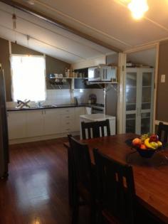 41 Harbourne Street Koongal QLD 4701 $232,000.00 FAMILY HOME AVAILABLE IMMEDIATELY. $232,000 3 1 1 This lovely family home is available to move into immediately. If you are looking for an investment property that is low maintenance then this property should be on your shopping list. The rental appraisal is $360 per week. Not in a flood affected area. Privacy plus with high timber fences. Enjoy the view to the beautiful and magnificent Berserker Mountains. This home is solid, renovated and fully air-conditioned through out. Sunroom. French Doors and rich polished timber floors through out this lovely home. Air-Conditioned spacious Lounge Room with rich polished timber floors Air-Conditioned Main Bedroom with beautiful polished timber floors and Built-Ins. 2nd Bedroom has Air-Conditioning and Polished timber Floors and a Built-In Cupboard. 3rd Bedroom has Air-Conditioning New Kitchen, Custom Built. Huge Gourmet Gas stove with an electric oven. Bottle Gas. Spacious dining room. The Bathroom is tiled and has a shower over a bath and vanity. Laundry under neath. Underneath has good stumps and is concreted. The back yard is fenced. Inspection Times Contact agent for details Land Size 536 m2