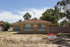 13 Hammond St Kellerberrin WA 6410 $170,000 GOVERNMENT HOME WITH DEVELOPMENT POTENTIAL This property is for sale on behalf of Government Regional Officers Housing (GROH). Located on South side of Kellerberrin town-site with views to rural farmland paddocks. Brick & tile construction 3 bedroom, 1 bathroom, L shaped lounge/dining, neat kitchen, spacious laundry and separate WC. Ducted evaporative Air Cond, instant gas HWS, gas oven and tile fire heating. Paved patio area to West side and small garden shed. Fenced yard to house and another full block area currently not used directly behind. Potential for subdivision or multi development on large 2024m2 (half acre) block. All inquiries to exclusive selling agents - Elders Real Estate, phone Will Morris 0448 415 537. Other features: Built-In Wardrobes,Close to Schools,Close to Shops,Close to Transport,Fireplace(s) Property Details Elders Property ID: 9368412 3 bedrooms 1 bathrooms 1 car parks Land Area 2024 square metres Single garage Air Conditioning