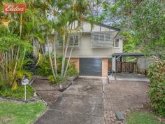 11 Caladenia Ct Everton Hills QLD 4053 WHISPER QUIET CULDESAC LOCATION ...talk to me about a cool and shady private deck at the front and a huge back deck overlooking the fully fenced rainforest garden. Tucked away in a peaceful and secluded cul de sac, well away from main roads, yet walking distance to convenience stores, coffee shop, restaurants and bus stop. This appealing high set post war home has a Queenslander feel about with gleaming polished timber floors and fret work. The air conditioned living area flows through French doors onto latticed deck. The kitchen and bathroom are modern and there is a second toilet on the lower level along with a big office and a study. Enjoy a walk through Teralba Parklands to Myer Brookside, Mitchelton Train Station with a bus stop close to hand. Located only 8km from CBD and 4km to Airport Link, this family friendly suburb is enjoying the fantastic capital growth it deserves. All manner of great educational opportunities, Private Hospital, Specialist Medical Centres, Master Home Maker Centre and every other service are within a 10 minute drive. This beautiful location is one of this suburbs best! ...talk to Di about these fabulous features -Brilliant spot! -Airconditioning -Ceiling fans -Huge deck -Fully fenced yard -Latticed front deck -Polished timber floors -Timber fretwork -Modern kitchen -Updated bathroom -Downstairs -Huge Office -Study -Second toilet -Garage access -New electric HWS -Tiled roof -New guttering -Gutter proofing Other features: Close to Schools,Close to Shops,Close to Transport,Garden,Secure Parking,Polished Timber Floor