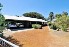 66 Reservoir St Chidlow WA 6556 $469,000 - $499,000 CHIDLOW CHARMER This is a 3 bedroom, 1 bathroom and 2 toilets home positioned on a cul de sac and opposite a nature reserve. The home is elevated, with limestone retaining walls giving views of the trees and landscaping surrounding the home. A double carport at the side of the home extends onto an outside entertaining area complete with fire pit. French doors lead into a good size lounge area. The kitchen cupboards are Tasmanian Blackwood and there is an island bench separating the kitchen and dining areas. A separate entrance and a wide hallway leads to the 3 bedrooms, main bathroom and very spacious office. The main bedroom is a good size with cupboards running along the length of the room. Bedroom 2 is a good size double with some storage cupboards. Bedroom 3 is the smaller of the bedrooms. The large bathroom comes complete with a claw foot bath. A large laundry with a separate toilet is accessible from the outside entertaining area. There is a reverse cycle air conditioner in the lounge and another in the main bedroom. A 12m x8m shed slabbed and powered with a smaller shed to the side and a rainwater tank. Easy maintenance gardens complete the package. Property Details Elders Property ID: 9354708 3 bedrooms 1 bathrooms 4 car parks Land Area 2592 square metres Double garage Double carport