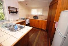 24 Rose St Kilkivan QLD 4600 $150,000 Looking for space? At an affordable price tag? This one ticks so many boxes. Large 1342 m2 level block. Mostly fenced. Solid large old timber home in good repair. 4 Bedrooms, plus on office and a sleep-out. Polished timber floors through out. Renovated bathroom with separate bath and shower. Good sized kitchen with open plan dining area. Separate front sunroom or second dining room. Double lock up colour bond garage and lock up timber workshop/shed. Town water, tank water and a good bore. Walk around the corner to the local shops and state school. The main street of the town is close by. With a couple of cafe's, post office, butcher, hair dresser, library, butcher, pup and antique store to name a few. the owners have decided to liquidate this property from their holdings and price it to sell. Inspections will not disappoint. Other features: Close to Schools,Close to Shops,Garden,Secure Parking Property Details Elders Property ID: 9285165 4 bedrooms 1 bathrooms 2 car parks Land Area 1342 square metres Double garage