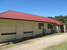 61 Domans Rd Kanigan QLD 4570 $425,000 49 Acres - Views - 5 Bedrooms - IG Pool This large family Homes features: 5 Bedrooms, 2 bathrooms,10ft ceilings, Large eat-in Kitchen, Double garage what would make a great rumpus / games room with timber floors, veranda with great north easterly views. The property has Separate packing shed set in the hills with timber floors and power metering make a great guest house, an 11m x 6m IG Pool, large Machinery shed, several large leveled work sites 20x30 arena. The land is hilly with rich volcanic type soil, coastal views, Chook run, Shade house, 2 bores one equipped with diesel pump and irrigation 2 1/2 inch mains, abundance of water storage with 6 tanks, 1/2 cleared with 100 mango trees ( kensington prides)20 custard apple trees and a few avocados. Very private location surrounded by larger farms and a the end of a no through road, only a few minutes to the local primary school and shops at Glenwood or only 20 minutes to Gympie. Is it time to get out into the country and enjoy the freedom. Property Details Elders Property ID: 9323482 5 bedrooms 2 bathrooms Land Area 49 acres