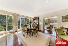 91 Empire Circuit Deakin ACT 2600 BLUE RIBBON LIFESTYLE OPPORTUNITY! Presenting a rare opportunity to secure a prestigious home in one of Deakin’s finest streets. Architecturally designed with light and space in mind, this home captures the grace and grandeur of this dress circle location. Generously proportioned spaces, an abundance of light and superior craftsmanship create a luxurious home of classic style and sophistication. This property includes the natural warmth and beauty of polished Jarrah floorboards and is complimented by elegant décor and quality finishes. This inviting home offers sun drenched lounge, dining and family areas, high ceilings, formal entrance with ornate chandelier, stylish bathrooms, segregated bedrooms and ample space for entertaining. The serene, picturesque garden has been designed to bring its ambience into the home through the large full length windows in the living areas. The new owners will appreciate the lovingly cared for mature landscaped grounds. The beautifully manicured garden rooms and circular drive add to the grand quality of this large 1455m2 estate. Features: • Classic light-filled layout with a comfortable natural warmth • Several spacious living areas include large formal lounge, informal lounge, dining and family room • Updated kitchen with granite benches, Smeg appliances and insinkerator • Large formal entrance with ornate chandelier • Polished Jarrah flooring throughout living areas with high ceilings • Spacious bedrooms, all with built-in-robes • Powder room – providing access from garden and inside access for guests • New ducted gas heating • Ample storage space throughout –with under stair storage ideal for cellar • Back to base alarm • Mature landscaped gardens with excellent structure and sprinkler system throughout the garden • Circular drive with porte-cochère • Single auto garage with internal access Offering excellent convenience, this prestigious residence is located only steps away from Canberra Girls Grammar School, and just minutes to Deakin Shops, Calvary John James Hospital, Parliamentary Triangle, Manuka, Kingston, Lake Burley Griffin and the City. Property Details Elders Property ID: 8955201 4 bedrooms 2 bathrooms 2 car parks Land Area 1455 square metres Single garage Single carport Energy Rating: 2