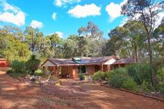 6 Humphry Rd Mundaring WA 6073 $599,000 - $649,000 DELIGHTFUL FAMILY HOME Looking for something peaceful and quiet and yet still only minutes to facilities? Seeking artistic inspiration? Wanting to unwind after a hard day’s work? Wishing to escape the hustle and bustle of city living? Wanting to get back to nature? Then this peaceful 3472 sqm block with bush reserve on one side could be the answer. The property offers a spacious 4x2 brick home with study/office, large shed with double carport and a brick workshop. Listen to the birds sing, and marvel at the abundance of new wildflowers, breathe in the fresh hills air and enjoy the peace and quiet that goes with living a true hills lifestyle. FEATURES • Brick / tile 4x2 plus study built • Large master bedroom with huge dressing room / baby’s room • Modern kitchen and updated laundry • Formal large lounge and dining • Large master bedroom with renovated ensuite and air huge dressing room / baby’s room attached • Secondary bedrooms with BIRs • Carport under the main roof • Rear patio/pergola • Colorbond shed with double carport attached • Small brick workshop with 3 phase power • Easy care 3472 sqm block with native gardens & gazebo • Close to Mundaring village • Easy commute to Midland & airport Set well back from the street, this private home offers a large master bedroom with a new elegant ensuite and a huge dressing room / baby’s room attached. The secondary bedrooms, main bathroom and separate renovated WC are towards the rear of the home. The study/office could easily be used as yet another smaller bedroom. The hub of the home is the open plan living area comprising a modern kitchen updated in recent years with views out to a pergola at the rear. Beautiful solid timber floors are an attractive feature of this open plan meals and family area with a s/c wood fire and air conditioning. Formal living areas are provided with the carpeted L shaped lounge and dining area. Outside is a brick workshop with 3 phase power and an as new colorbond shed complex comprising a double garage of 6m x 7m with a similar sized double carport attached and to the front. The roller doors to the shed are at different heights to accommodate higher vehicles etc Easy care native gardens surround the house and a smattering of citrus trees are overflowing with fruit. Located in a quiet street, close to Mundaring village and an easy commute to Midland and the airport. Start the adventure today. Call for more details or an inspection. Be quick for this one. Other features: Built-In Wardrobes,Close to Schools,Close to Shops,Fireplace(s),Garden,Secure Parking,Shed Property Details Elders Property ID: 8572721 4 bedrooms 2 bathrooms 6 car parks Land Area 3472 square metres Car Parks: 2 Double garage Double carport Air Conditioning
