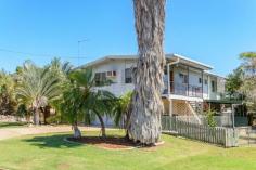 11 Acacia Ct Kin Kora QLD 4680 $269,000 Central Highset with Great Yard & Space Galore! Start the new year right!, In this fresh to the market, fully air-conditioned highset home that offers the perfect balance of quite & convenient living. Set towards the end of one of Kin Kora’s quietest cul-de-sacs, but within walking distance to schools, Gladstone Golf Course, major shopping centres and more, is bound to make a lucky new owner very happy indeed! Internally, the upstairs area consists of 3 bedrooms, ALL with fans, built-in-robes, and air-conditioning. The main bedroom is exceptionally large and capable of accommodating a king sized bedroom suite! The bathroom has been recently renovated with large spa-bath , beautiful cobble stone finishes, separate shower and extra wide vanity. Just take a look at the kitchen!! Full timber cabinetry with marble stone bench-tops, double sink, large pantry, range hood, breakfast bar, large fridge housing and more! You can’t floor it! Just off the kitchen you’ll find the air-conditioned living area with polished timber floors that flow through to throughout the upper level. In addition to this, the upstairs level has TWO separate verandas with stairs on both sides providing access to the lower level. Downstairs will catch your eye! It’s fully built in and backing on the double garage is a carpeted area currently being used as a 4thbedroom though is large enough to be used as a theatre, rumpus, pool room and could even be partitioned into separate rooms completely! In its current layout, there is an additional nook to the side of this area, perfect for a study! The laundry is fully equipped with a shower & toilet, servicing the downstairs area. Similar to the top level of the home, there are TWO further additional outdoor pergola areas for outdoor living that are fully covered and look out to the backyard. The property offers a large, fully fenced flat back yard, with side access on both sides with room for the boat, extra vehicles, and plenty of room for the shed! For all this well under $300,000, it’s surely to receive a great deal of interest off the bat! Don’t hesitate to call today to organize an inspection you won’t regret! Property Details Elders Property ID: 9167187 3 bedrooms 2 bathrooms 2 car parks Double garage