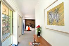 10/10 Tank Street Phillip ACT 2606 $330,000 Central Woden location within walking distance to Canberra Hospital This modernised two bedroom apartment benefits from the North Easterly aspect with leafy views offering the perfect orientation for light, airy and private living. The open plan lounge and dining room area is overlooked by a very generously sized kitchen with new oven, cook top and dishwasher. With plenty of bench space, extra shelving and a breakfast bar, this kitchen resembles those found in houses rather than an apartment. Both the bedrooms have built-in wardrobes and are separated by a large bathroom with spa bath and European style laundry. Features: - Central Woden location close to the hospital - Approx 89m2 first floor apartment in small complex - Reverse cycle air-conditioning and EER 6 stars - Balcony with views of mature leafy trees and parkland - Modern decor including lined curtains and LED down lights - Carport plus visitor parking and intercom system Figures: - Body Corporate fees $3819 per annum including sinking fund - Body Corporate manager - ACT Strata Management Services - Units Plan 995 - Rates TBA - Land Tax (payable for investment properties only) TBA - EER 6 - 88.9m2 living + 8m2 balcony - Built 1993 A very well updated and maintained apartment that is vacant and ready to move in to. Alternatively it would make an ideal investment property with demand from prospective tenants strong in this area. Property Snapshot Property Type: Apartment Aspect Views: North East Construction: Brick Veneer Zoning: Unit No: 10 House Size: 88.90 m2 Features: EER 6.0 EER: 6.0