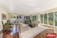 91 Empire Circuit Deakin ACT 2600 BLUE RIBBON LIFESTYLE OPPORTUNITY! Presenting a rare opportunity to secure a prestigious home in one of Deakin’s finest streets. Architecturally designed with light and space in mind, this home captures the grace and grandeur of this dress circle location. Generously proportioned spaces, an abundance of light and superior craftsmanship create a luxurious home of classic style and sophistication. This property includes the natural warmth and beauty of polished Jarrah floorboards and is complimented by elegant décor and quality finishes. This inviting home offers sun drenched lounge, dining and family areas, high ceilings, formal entrance with ornate chandelier, stylish bathrooms, segregated bedrooms and ample space for entertaining. The serene, picturesque garden has been designed to bring its ambience into the home through the large full length windows in the living areas. The new owners will appreciate the lovingly cared for mature landscaped grounds. The beautifully manicured garden rooms and circular drive add to the grand quality of this large 1455m2 estate. Features: • Classic light-filled layout with a comfortable natural warmth • Several spacious living areas include large formal lounge, informal lounge, dining and family room • Updated kitchen with granite benches, Smeg appliances and insinkerator • Large formal entrance with ornate chandelier • Polished Jarrah flooring throughout living areas with high ceilings • Spacious bedrooms, all with built-in-robes • Powder room – providing access from garden and inside access for guests • New ducted gas heating • Ample storage space throughout –with under stair storage ideal for cellar • Back to base alarm • Mature landscaped gardens with excellent structure and sprinkler system throughout the garden • Circular drive with porte-cochère • Single auto garage with internal access Offering excellent convenience, this prestigious residence is located only steps away from Canberra Girls Grammar School, and just minutes to Deakin Shops, Calvary John James Hospital, Parliamentary Triangle, Manuka, Kingston, Lake Burley Griffin and the City. Property Details Elders Property ID: 8955201 4 bedrooms 2 bathrooms 2 car parks Land Area 1455 square metres Single garage Single carport Energy Rating: 2