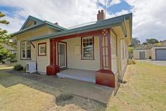 25-27 Queen Street West Ulverstone TAS 7315 Another old charming home of yesteryear AGENT ON SITE - This Friday 29/1/2016 from 10:30AM AUCTION - This Friday 29/1/2016 11AM on site This stunning landmark Ulverstone home will impress you from the moment you drive through the gates and it comes with a few options. Situated on a 2094m2 level block, the neat and tidy house consists of a spacious combined kitchen/dining with a walk-in pantry, a separate lounge, 4 bedrooms, 2 bathrooms, storage, a single garage and a 12m x 7m garage. This home features high ceilings, open fire places, a wood heater as well as a reverse cycle heat pump. The fully fenced property has a huge backyard with established trees and has some subdivision potential (subject to Council approval). It is located within very short walking distance to the shopping hub of West Ulverstone, sports grounds, school, parks, the wharf, the Leven River and the beach. This property is listed on the Heritage register. General Features Property Type: House Bedrooms: 4 Bathrooms: 2