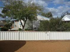 19 Railway Street BEVERLEY WA 6304 $295,000 A FUSS-FREE PACKAGE This perfectly presented 3 bedroom, 1 bathroom Fibro & iron home is a fuss-free package situated on a 729sqm block. Everything is completed with nothing to do....from sealed verandahs, double garage/shed, lawn area, garden beds, and tasteful fencing to enclose the yard for the safety of children or pets. All combining to make this property extremely low maintenance and fuss-free. Perfect for the first home buyer, investor or down-sizing. Property Details Elders Property ID: 9066584 3 bedrooms 1 bathrooms 2 car parks Land Area 729 square metres Double garage