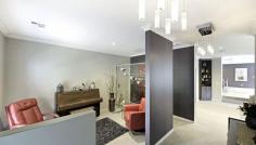 101 Miller St O'Connor ACT 2602 Passion, Drive and Energy.. Auction 16/03/2016 - In room auctions LJ Hooker Canberra City level 1, 182-200 City Walk Canberra City at 6.00pm. It has taken all of the above to create something as attractive as this wonderful O’Connor home. The current owners have loved being so close to the City and the local attractions such as the Lyneham shops, the ANU and the Golf Course. The approaching retirement with a move to the country has prompted the sale at this time. The home is 6 years young, features four generous bedrooms, ensuite bathroom, two infinity gas hot water systems so you need never to run out of hot water. We think you will like the study or music room and its glass wall plus take a close look at the dedicated split level home theatre that has to be experienced to be fully appreciated. The theatre comes with a 130 inch screen and cinema quality JVC projector. You can discuss the existing seating and speakers as an optional extra. There are many hidden extras within the home including soft closing draws, Baumatic appliances including the fully integrated dishwasher, microwave and gas cooker. The front windows have been double glazed, ducted gas heating is installed as well as ducted evaporative cooling and a great looking real flame gas heater stands in a central location dividing the living areas. In slab heating is installed in the ensuite so mornings will be comfortable for you. The family room faces north for added comfort and also opens to a covered alfresco dining area with two external gas outlets. Standing front and center is a marvelous Japanese maple tree as part of the landscaped garden which includes a productive vegetable patch. The triple garage has a drive through facility and part of this area is used as a gym by the current owners. A pull down ladder also provides access to above garage storage in the roof loft has been reinforced. The loft has power and lights and three skylight ventilation units providing extra light in the roof cavity. The block size is 724m2. If you are looking for a modern home in such a great location with all the best that O’Connor has to offer we suggest you view this home as soon as possible, you will not regret your decision to do so. * Open plan living includes lounge, family and quality kitchen with walk in pantry * Office or music room * Four bedrooms with ensuite to main * Master bedroom has custom made large walk-in wardrobe * Bedroom two has custom made walk in wardrobe and sliding door to alfresco area * Bedroom 3 and 4 have built in robes * Home theatre includes screen and projector * Ducted gas heating and ducted evaporative cooling * Real Flame heater as a living room feature * In slab heating to ensuite * Triple garage with storage loft and large custom made cupboards * landscaped garden and vegetable patch * Two Infinity Gas hot water services * Alfresco covered outdoor area with outdoor fan and data points * double glazed windows to front of home * Northern aspect to living rooms * Ducted Vacuum included * Fridge able to be connected for ice making * Baumatic appliances including Dishwasher, Microwave, Gas Cooker, Oven Property Snapshot Property Type: House Land Area: 724 m2 Features: EER: 4.5