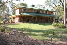 1315 SELMA ROAD Emerald QLD 4720 $729,000 RURAL LIVING LIFESTYLE AT IT'S BEST!! If it is a rural lifestyle you are chasing, close to a major centre then you must inspect this one. "Yarandoo" is located on Selma Road on the way out to Fairbairn Dam. You have approx 168 acres of bush where you can live very privately, but yet be so very close to town. The home itself is magnificent. The double storey brick veneer home will be the envy of your friends. The home features 5 bedrooms and 2 bathrooms upstairs and downstairs is your main living areas, including a formal lounge, everyday lounge and a powder room plus 2 offices. The kitchen is very spacious and overlooks your backyard. You have plenty of bench and cupboard space and the view is fantastic. The home has an all encompassing layout so you can feel like you are all a part of things whilst getting the jobs done around the home. This certainly is a home with all the trimmings. The property has a number of paddocks and a multitude of water available from Fairbairn Dam. You will not need to panic about running out of water and the price of living out here with rates and water is substantially less than in town. The property has a number of little paddocks for small animals and sheds for shelter. You also have a magnificent vegie patch. This presents a very good opportunity to buy into the market well and get yourself a beautiful family home in the mix. Come out and have a look at the open home and give me your opinion. Everyone welcome. Other features: Built-In Wardrobes,Fireplace(s),Garden,Formal Lounge Property Details Elders Property ID: 8904724 7 bedrooms 3 bathrooms 2 car parks Double garage Swimming Pool Air Conditioning