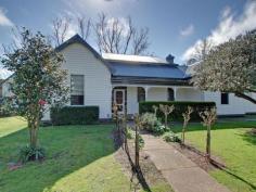 128 Gibsons Rd Sale VIC 3850 $795,000 Character Charm and lifestyle are available at "Sunny Holme" Ideally located on the edge of Sale township on 1.6 hectares this versatile property successfully blends old and new. The weatherboard home offers country living with an entry that opens onto a cozy lounge with wood heating and a lovely timber feature staircase leading to the second storey of extra large main bedroom with outstanding outlook ,ensuite and walk in robe. Downstairs there is a large family/billard room with wide verandah and overlooks the rural vista of the area. There are also 2 large bedrooms with high ceilings, built in robes ceiling fans and large windows. There is also a fourth bedroom or study/office off the kitchen area. The country style kitchen/meals area has plenty of storage with wall oven and hotplates and dishwasher. The home offers high ceilings, large windows, timber features, wide verandah and timber decking, town water. With access under the verandah is also a separate 'Guest House' ideal for many uses including guests room, teenage retreat, recreation room, theatre room or even a B & B. There is also another staircase leading to a second space which also takes in the rural surrounds. Surrounding the private property is an established garden of tree's, fruit trees and plants. There are many peaceful sitting/relaxing areas including a paved BBQ spot. The driveway is fully sealed and leads to a large steel shed of 9m x 18m with high roller door entry, concrete flooring, power and loads of workshop space. There is also some extra outbuildings including an old weatherboard garage, chook pen and yards and orchard. A versatile property that offers character charm and an endless array of opportunities as a family home, possible B & B, hobby farm, home business or just a plan change of lifestyle. Property Snapshot Property Type: House on acres Construction: Weatherboard Land Area: 1.60 ha Features: Billiard Built-In-Robes Ceiling Fans Decking Dishwasher Ensuite Established Gardens Family Room Garden Shed Gas High Ceilings Lounge Outdoor Living Polished Timber Floors Rumpus Room Rural views Shed Staircase Storage Study Verandah Walk-In-Robes Wood Fire Workshop