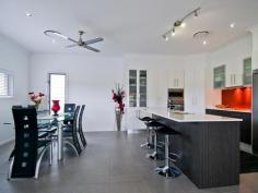 12 Honey Myrtle Close Burrum Heads QLD 4659 $479,000 VALUE PACKED LAKESIDE HOME - ROOM FOR THE CARAVAN HERE. This outstandingly presented home is new to the market, and ticks so many boxes for astute buyers. Perfectly presented, the home has a large floor plan, in keeping with modern and relaxed living. The home overlooks an impressive fresh water feature lake, enjoying direct water views and cool breezes from the covered out door patio. There are three large built in bedrooms, the master with WIR and en-suite, media room, large main bathroom, laundry and a combined kitchen, dining and family room. There are first class appliances throughout the home, and extra features include ducted air conditioning, ceiling fans, 9' ceilings, quality floor coverings. (carpets in media room & bedrooms, balance tiles), crimsafe screen door, lockable windows and doors. Caravan parking is well catered for with a secure screened area adjacent to the double lock up garage (remote lift door) and a second bay for the tinny. The gardens are low maintenance and watered by a garden bore and irrigation system. The sellers have priced the property to represent great value, and buyers should inspect soon. Other features: Built-In Wardrobes,Garden,Secure Parking,Formal Lounge Property Details Elders Property ID: 9227403 3 bedrooms 2 bathrooms 4 car parks Land Area 639 square metres Car Parks: 2 Double garage Air Conditioning