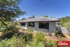 1 Skinner St Cook ACT 2614 POTENTIAL PLUS! It’s always a lovely surprise to find a welcoming home in the ever popular suburb of Cook! Situated in a quiet street, this charming 3 bedroom home is perfect for young families and professional couples who appreciate the opportunity to renovate to their own tastes and budget while also being surrounded by quality homes and great neighbours. This light filled residence includes an updated kitchen, bathroom and laundry, spacious lounge and dining with lovely garden outlooks, polished timber floors, all bedrooms with built-in-robes, ducted gas heating, large covered deck, mature landscaped gardens and peaceful surrounds. Visit today and discover why Cook is regarding as one of Canberra’s most live-able suburbs. Quiet streets, leafy surrounds and superb native bush reserves while still offering such easy access to all of North Canberra’s major facilities – Jamison Plaza, ANU, University of Canberra, Belconnen Town Centre, Calvary hospital and Bruce Stadium. Close to the base of Mount Painter - experience easy access to one Belconnen’s best reserves. Features: • Light and bright renovated home in a quiet loop street • Updated kitchen with gas cooktop, dishwasher and overlooking the deck • L-shaped lounge and dining with lovely garden outlooks • Updated bathroom with floor to ceiling tiles and new toilet • All bedrooms with built-in-robes • External electric awnings on North facing windows • Ducted gas heating • Reverse cycle air-conditioner plus ceiling fans • Large covered deck with ramp and clear outdoor bistro blinds to the south-west side • Established landscaped gardens • Carport with roller door • Garden shed • Ample off street parking Property Details Elders Property ID: 9213189 3 bedrooms 1 bathrooms 1 car parks Land Area 723 square metres Single carport Energy Rating: 1.5
