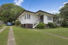 11 Barber St Keperra QLD 4054 WALK TO TRAIN!!! ...talk to me about this post war charmer in a brilliant location. Close enough to train station for a quick walk and far enough away for a peaceful lifestyle. Walk to convenience store and take away food outlets. Located within the magic 10km of the city, and with recent approval granted for a Bunnings Centre, values in this suburb are about to skyrocket. Embrace the magic of a huge eat in family kitchen and three big bedrooms. Polished timber floors throughout with the living room flowing through French doors onto an elevated and cosy front deck. The main bedroom is airconditioned and there are ceiling fans to other rooms. The yard is shady and cool- perfect spot for an afternoon snooze in a deck chair. Family friendly parklands in walking distance complete with bike paths. Get in before the prices rise! ...talk to Di about the following fabulous features -Easy walk to train -Shops and park nearby -Quiet elevated location -Air-conditioned main bedroom -Polished timber floors -Ceiling fans -Large eat in kitchen -French doors on to cosy deck -Window screens -Gas cooking -Tiled roof -Fully fenced Other features: Close to Schools,Close to Shops,Close to Transport,Garden,Polished Timber Floor Property Details Elders Property ID: 9104377 3 bedrooms 1 bathrooms 2 car parks Land Area 625 square metres Double garage Air Conditioning