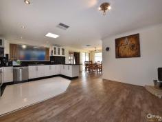 100 Santa Barbara Parade Quinns Rocks WA 6030 **O.M.G. YOUR FAMILY WILL LOVE YOU FOREVER WHEN YOU MOVE IN HERE** Inspection Times: Sun 14/02/2016 12:00 PM to 12:30 PM End Date Sale: 28 February 2016 Don't be deceived by how "normal" this home looks from the street. This property is below replacement cost! True it was once a normal 4 x 2, but with love and professional expertise from its owners it has grown to be a hub of entertainment paradise. The large pool will keep the kids happy, while the massive spa keeps the adults entertained at night. During the cooler days you can still enjoy the outdoors under the big wrap around patio. The cinema with integrated surround sound will blow your mind. If you ever wanted your own pub you will be in heaven. There is room for a competition size snooker table or you can simply use the space as a dance area . The kitchen has over 7 metres of granite bench tops in the newly fitted kitchen All bedrooms and family areas have brand new flooring, For the self employed there is an enormous office/ consulting room with its own separate entrance The garage has 2 large storage areas as well as high ceilings so your truck/ caravan/ boat can fit inside securely. Landscaped front garden and still space for 4 car parking This one won't last long so make sure you view it this week. PROPERTY DETAILS End Date Sale ID: 357690 Land Area: 662 m²