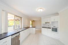 13 Carthurbie Ct New Auckland QLD 4680 $650,000 CLEVER DESIGN FOR A LARGE FAMILY! Situated in the very popular suburb of Parksville & set on a large 3303m2 flat block with its very own creek! This home is big enough for the largest of families! The central spacious kitchen is perfectly nestled between the air-conditioned family room and separate dining room and looks out over the in-ground pool so you can keep an eye on the kids while you prepare dinner. Cleverly designed, the formal lounge and the air-conditioned main bedroom with its lovely ensuite and walk-in robe are situated at one end of this long ranch style home while the other 4 bedrooms, study/6th bedroom, main bathroom and air-conditioned rumpus room are at the other. The rumpus room is the 3rd living area and is an excellent kids play room or teenage retreat! The main bathroom has a powder room so the there is no fighting over the bathroom in the morning! Outside there is a large covered area plus a huge concrete pad for parking or extending the covered entertaining area. There is also a great in ground pool and large garden shed all surrounded by lovely landscaped gardens which includes your very own creek at the back of the block which actually runs when there has been really heavy rain! This home is perfect for the large family and should not be missed at this price! Call Julie or Graeme today to inspect! Property Details Elders Property ID: 9346942 5 bedrooms 2 bathrooms Land Area 3303 square metres
