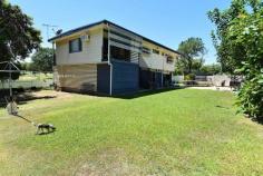 66 Baker St Richmond Hill QLD 4820 $298,000 **EXCLUSIVE AGENCY**UPDATED 4 BEDROOM FAMILY HOME IN RICHMOND HILL** Property ID: 3689058 Inspection Times: Saturday 12 March at 12:00PM to 12:45PM Exclusive Listing This home is solid as a rock. 66 Baker Street is a standout high set home sure to please any family or astute investor. Location wise this property is exemplary, not only is it situated in Richmond Hill it is within walking distance to schools, beautiful parklands, eventide retirement village and the CBD. Also there are no neighbours on one side as there is a seasonal football field. Internally the home has been well appointed with a centrally positioned kitchen and spacious dining and lounge with stunning polished timber floors and front and back veranda access. With 4 spacious bedrooms and a beautifully updated bathroom this house will cater for any family very comfortably. Entertainment wise you have the entire downstairs area, which has a built in bar area with space for fridges, this area has a tremendous amount of storage space as well as a laundry area. Futuristically there is the possibility of creating an extra bedroom or built in living area if required for the growing family. Situated on a secure manicured block this home is well worth your time inspecting, contact Raine & Horne Charters Towers today. Features: Block: 1042m2 Fully fenced with double lockable gate access. Kitchen/Dining/Lounge: Open planned, spacious, well-appointed kitchen, front and rear veranda access. Bedrooms: 4 Spacious bedrooms, Master, 2nd and third have built ins, all have a/c and carpet. Bathroom: very modern bathroom fully tiled with double vanity and full length mirror as well as tiled shower recess and second built in cupboard and mirror. Separate toilet. Veranda’s: Front and rear timber veranda’s, rear has internal staircase and front has stairs to main yard area. Entertainment/Rumpus: Huge area with built in bar area and the option of fully enclosing to create second living area or granny flat. Laundry: downstairs internal location. Carport: single lockable carport underneath house with Roller door and concrete driveway. This is a very neat property in a prime position, Contact Lisa Palmer at Raine & Horne to arrange your inspection on 0438 852 136. Land Area 1,042.0 sqm