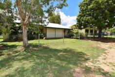 45 Cambridge St Charters Towers QLD 4820 $265,000 **IMMACULATE FAMILY HOME & SHED PACKAGE CLOSE TO CBD** Property ID: 2173618 Just a short distance from the Charters Towers CBD is this well presented 3 bedroom block family home and shed package on a 1003m2 Block. Internally the home is open planned and well-appointed and spacious and features open planned living areas and generous bedrooms, the home has ducted evaporative air-conditioning throughout for comfort during the warmer months plus the master bedroom has an additional box air conditioner. Entertainment wise the home features a front verandah which leads into a double carport which would double as the entertainment, rumpus or play area or there is the huge 3 bay Colorbond powered shed with full length awning. Outside the home there is manicured lawns and established gardens and the block is fully fenced with steel fencing and 2 x double gates both lockable. This property truly is well worth your time inspecting and definitely caters for all members of the family. Location is impeccable as it is just a short distance to the CBD, Sporting facilities as well as reputable education facilities. Contact Raine & Horne Charters Towers today and arrange and appointment. Features: Block: 1003m2 fully fenced with lockable gate access to both carport and shed area. Home: Masonary block construction. Bedrooms: 3 Spacious Bedrooms, Evaporative a/c throughout, master has built ins plus additional box a/c and remaining bedrooms have room for built ins. Kitchen/Dining/Lounge: Spacious, open planned, front verandah access as well as rear yard access from dining, ducted evaporative a/c throughout. Kitchen has plenty of cupboard and bench space and overlooks the rear yard. Laundry: Internal laundry with double stainless tub, outside access and room for built-in storage. Bathroom: Tiled bathroom, with built in linen cupboard, shower over bath recess, vanity, separate toilet. Carport: double carport with lockable storage facility. Carport could double as an entertainment or undercover area as there is additional off street parking at the shed. Shed: State of the art 3 bay powered Colorbond shed with 3 roller doors and full length awning. Security Screens throughout. Solar hot water. Here is an opportunity to secure a practicle solid spacious family home with killer shed and yard area so close to the CBD. Contact Lisa Palmer on 0438 852 136 ASAP as this property will not last long. Land Area 1,003.0 sqm
