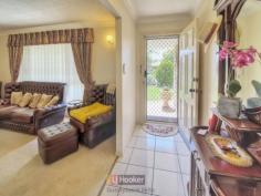 12 Currajong St Calamvale QLD 4116 $515,000 ALREADY BOUGHT - MUCH LOVED HOME MUST BE SOLD!!! Walking distance to the 140 bus stop and only two minutes' drive to Calamvale Central and Sunnybank Hills Shoppingtown, this well-priced brick home is a must-see for 1st time buyers, families and investors. Built about 22 years ago and enjoying a private position on this 477m2 block, the house has been lovingly maintained - presenting extremely well inside and out. From the front gates, a driveway leads past a sizable area of grassy lawn and some leafy garden beds, up to a single car garage and the home's main entry under a pretty front porch. The interior has multiple living areas - including a carpeted formal lounge and dining room at the front and an open-plan tiled kitchen and family living area extending off the entry foyer. This kitchen/family space is air-conditioned and has access through a screened sliding glass door out to the spacious entertaining patio running down the side of the house. The patio is covered for year-round entertaining and opens out to a private back yard with lots of lawn and well-established gardens. The kitchen is well-equipped with a corner pantry, breakfast bar, dual sink with draining board, electric stove, range hood, dishwasher and stacks of above and below bench storage. On the accommodation front, there are three carpeted bedrooms - all with built-in robes. The master has its own ensuite, while the other rooms share a family-size bathroom. Additional features include: - A total of 2 air conditioners - Ceiling fan in lounge - 2 separate toilets - Laundry In a quiet street with well-maintained neighbouring homes, this property represents great value for money and needs to be seen to be truly appreciated! All information contained herein is gathered from sources we consider to be reliable. However we can not guarantee or give any warranty about the information provided and interested parties must solely rely on their own enquiries. Property Snapshot Property Type: House Land Area: 477 m2 Features: Ensuite Air Conditioning Dishwasher