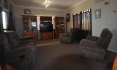 32 Burgamoo Road Helens Hill QLD 4850 $369,000 Substantial two storey 5 bed home on an acre of land just 10 minutes from town. Property ID: 7063956 This private, modern family home provides for the large or extended family. Upstairs offers 4 bedrooms (Three which open onto the full length verandah) plus study with open plan living and dining. A new kitchen with long island bench that offers extra storage space and comfortably seats four adults is the focal point of the house. The upstairs laundry boasts plenty of storage, room for extra fridges or freezers and is conveniently located next to the kitchen. Downstairs has a separate living area ideal for extended family, teenagers or home office. Offering a large lounge area, modern bathroom and an extra bedroom with generous storage. A great place to entertain, this space has direct access to a very large, fully lockable garage which would accommodate two cars, four wheeler, ride on and camper trailer. If it is green living that you are after you will love the bore and large chook pen. To appreciate the features and abundance of space this rural property provides call for your private inspection.
