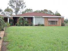 128 Mount Stanley Rd East Nanango QLD 4615 $299,000 ONE ACRE WITH MASSIVE SHED Property ID: 7457870 This was an executive brick home in it’s day, and you can still see the style today. The home offers 4 over-sized bedroom with built-in robes, plus a computer nook. Then you have an open plan kitchen/dining/lounge area with a wood heater. Plus a sunken lounge or rumpus room. The laundry is also over-sized. Then when you step outside you find that the shed too is over-sized. Previously it housed 3 buses, so you could say there is ‘room to move’ in it. It also has power and lights. The location puts you about 1 km into town, but you do not have town water or sewer. This means that your rates are cheaper. The previous owner had pensioner discounts, but without the discount the rates should be about $1300 pa. Well worth a look, and if you leave it too long the current owners are likely to rent it out. So hurry. Land Area 4,034.0 sqm