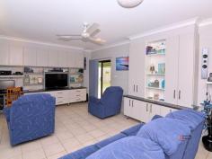 1 Acacia Cl Tully Heads QLD 4854 $320,000 SOLID BLOCK 3 BEDROOM HOME IN TULLY HEADS This charming house is situated in beautiful Tully Heads, close to the beach and boat ramps. The house has a beautifully tended garden that welcomes you as you pull up in the front. A car port fronts the sizeable barbeque area and is complimented by the double garage/car port at the rear of the house. As you enter the house you will enter the Living/dining room that runs the full width of the house. The kitchen is at the front of the house, conveniently located adjacent to the dining area. The kitchen is fitted with an in-bench hotplate and stove unit and a dishwasher. The kitchen has two windows that ensure it can be flooded with natural light as desired. There are plenty of under-bench and overhead cupboards cleverly arranged around the work area. The kitchen's compact size means everything is easily accessible and convenient. A laundry is the first room leading off a hallway that separates the bedrooms, bathroom and toilet from the main living area. There are three bedrooms, all with built-in robes. The separate bathroom and toilet are conveniently located close to the bedrooms. The house is fully tiled and fitted with air-conditioning throughout. There is an electric HWS. This is a well-appointed, compact house that would be ideal for a young family looking for a low upkeep house with all the little luxuries that make living in this pristine coastal environment such a pleasure. Property Snapshot Property Type: House Construction: Concrete Block Land Area: 687 m2 Features: Fenced Back Yard Security Screens Verandah