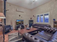 21 Lily St Goodwood SA 5034 $680,000 to $720,000 IMPRESSIVE CHARACTER BLUESTONE SYMMETRICAL COTTAGE Inspection Times: Sat 19/03/2016 01:00 PM to 01:45 PM Sun 20/03/2016 01:00 PM to 01:45 PM OPEN SAT 19TH & SUN 20TH MARCH 1.00 - 1.45PM Set in the heart of the Goodwood village precinct this well-kept Character bluestone symmetrical cottage is perfect to live in and improve over years to come. The location speaks for its self, cafes, restaurants, and boutique shopping of both Goodwood rd. and King William rd. all within a short walking distance. Ranges of public transport whether it be Tram, Train or bus are all conveniently located. Circa 1890 this bluestone Symmetrical cottage has been very well maintained through the years and a much loved family home for the last two decades. Now it's ready for its next custodians to love cherish with the abundance of land at the rear and side this home caters for many possible improvements. An impressive home form the moment you arrive. The high ceilings and polish timber floors give a sense of character and warmth that can be lacking form more modern homes. The three bedrooms are all of generous size and easily accommodate queen to king size beds in each room. The central hall leads you to the extended kitchen dining area. Updated in 2002 this spacious area is compete with tiling and large black wood kitchen with updated Smeg 900mm oven and gas cook top. Spaning the complete width of the home the rear alfresco recently re-roofed is a fantastic place together with family and friends easily accommodating the BBQ and outdoor furniture. PROPERTY DETAILS $680,000 to $720,000 ID: 362273