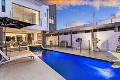 22 William St Mermaid Beach QLD 4218 $2,000,000 MODERN. SPECTACULAR. BEACHSIDE Property ID: 7205589 Striking modern design sets this beachside residence above the rest. If you are demanding the ultimate lifestyle living in this sought after location… look no further! The lower level is open plan and with expansive doors opening to both front and back patios that invites the outdoors in, and makes for great entertaining and family fun. The sheltered north facing patio is perfect for al fresco dining and overlooks the tiled pool. Here you’ll also find a third bathroom, perfect for guests or showering after a surf or dip in the pool. Upstairs is comprised of three bedrooms and a study, including a massive main bedroom with a luxurious ensuite and walk in closet. As an added bonus, there is a media room for digital media or just quiet relaxation. With the sparkling shores of the Pacific Ocean at the end of the street, you can be assured of the quality in location. This highly sought after Mermaid Beachside opportunity offers a lifestyle of world class dining, shopping, cafe and entertainment experiences and of course, our famous beaches. For inspections contact Rob Comer & Kae Beadman (Raine & Horne Mermaid Beach) Land Area 405.0 sqm