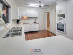 19 Koumala St Mansfield QLD 4122 RENOVATED 4 BED HOME IN GREAT LOCATION Is your family seeking a quiet & peaceful location, surrounded by high quality schools & loads of amenities? Then this sturdy, classic, renovated highset home needs you! This well reputed area of Mansfield is in fantastic proximity to several highly regarded schools. This is the perfect place to nurture a quality education for your children. A nearby walkway to the next street gives access to express buses and others , including routes to Fortitude Valley, Queen St in the city, and Westfield Garden City facilitating easy transfer to any Uni bus route. You can also walk to local shops, post office, doctor, dentist, and Mansfield State High School and Primary School.. In a quiet and elevated position, this prime property stands up above the rest. From the upstairs verandah you can catch beautiful breezes not to mention lovely green views out across the suburb and beyond to Mt Cotton. Overlooking the big backyard, the back verandah is a perfect extension of living space to relax and watch the sun set in the afternoons. Inside, the lower level has been renovated into a second living area for teenagers, extended family, or even for renting out a room. There's a large tiled living area that could be used as a living space on one side and a bedroom or office around the corner, as well as a separate bathroom with shower. This downstairs space has both a front and back entrance, separate to the upstairs entries, and also has an internal staircase. The upper level is spacious and bright with a large open plan living and dining area that flows from the front porch, through the house, and out onto the back verandah. The front porch is fully enclosed with security grills for an open, relaxing, nature-like feel. You can even have a daybed and fall asleep out here. Inside, the kitchen is brand new with lots of storage space, good quality modern appliances and a big window looking out across the suburb. Other fantastic features that you'll love about this property include: - 8,200L and 4,500L water tanks - Mature fruit trees in the yard - Beautiful timber floorboards in kitchen & dining - Soft, clean carpets in living & bedrooms - Renovated family bathroom with separate bath and shower - Low maintenance gardens with gardenbeds & established greenery - Internal & external entries on both levels - 2-car garage downstairs - Lower level perfect for dual-living or a home office - Fully fenced backyard ....children and pet ready With 4 large bedrooms to cater for your family, this much-loved family home is ready for you to move into and benefit from the range of conveniences and comforts it has to offer. Call us today to find out more. THIS AUCTION WILL BE HELD ON SITE. All information contained herein is gathered from sources we consider to be reliable. However we can not guarantee or give any warranty about the information provided and interested parties must solely rely on their own enquiries. Property Snapshot Property Type: House Land Area: 650 m2 Features: Deck