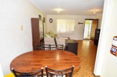 45 Cambridge St Charters Towers QLD 4820 $265,000 **IMMACULATE FAMILY HOME & SHED PACKAGE CLOSE TO CBD** Property ID: 2173618 Just a short distance from the Charters Towers CBD is this well presented 3 bedroom block family home and shed package on a 1003m2 Block. Internally the home is open planned and well-appointed and spacious and features open planned living areas and generous bedrooms, the home has ducted evaporative air-conditioning throughout for comfort during the warmer months plus the master bedroom has an additional box air conditioner. Entertainment wise the home features a front verandah which leads into a double carport which would double as the entertainment, rumpus or play area or there is the huge 3 bay Colorbond powered shed with full length awning. Outside the home there is manicured lawns and established gardens and the block is fully fenced with steel fencing and 2 x double gates both lockable. This property truly is well worth your time inspecting and definitely caters for all members of the family. Location is impeccable as it is just a short distance to the CBD, Sporting facilities as well as reputable education facilities. Contact Raine & Horne Charters Towers today and arrange and appointment. Features: Block: 1003m2 fully fenced with lockable gate access to both carport and shed area. Home: Masonary block construction. Bedrooms: 3 Spacious Bedrooms, Evaporative a/c throughout, master has built ins plus additional box a/c and remaining bedrooms have room for built ins. Kitchen/Dining/Lounge: Spacious, open planned, front verandah access as well as rear yard access from dining, ducted evaporative a/c throughout. Kitchen has plenty of cupboard and bench space and overlooks the rear yard. Laundry: Internal laundry with double stainless tub, outside access and room for built-in storage. Bathroom: Tiled bathroom, with built in linen cupboard, shower over bath recess, vanity, separate toilet. Carport: double carport with lockable storage facility. Carport could double as an entertainment or undercover area as there is additional off street parking at the shed. Shed: State of the art 3 bay powered Colorbond shed with 3 roller doors and full length awning. Security Screens throughout. Solar hot water. Here is an opportunity to secure a practicle solid spacious family home with killer shed and yard area so close to the CBD. Contact Lisa Palmer on 0438 852 136 ASAP as this property will not last long. Land Area 1,003.0 sqm
