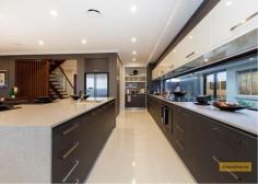 12 Dularcha Street Caboolture South QLD 4510 Truely - STUNNING - and all the WOW.. Property ID: 8079855 This display home is out of this world. AND NEEDS TO BE SOLD NOW!!. Perched on 640m2 on some of Queensland’s finest earth, this magnificent display home is NOW available for you to call home. With that many features and packed with all the extras you would expect from an executive level Metricon double story display home. Picture yourself, entertaining friends in the stunning rumpus room, watching the kids splash in the pool, or just living the life of your dreams. Go for it, you deserve it.. Features include: • Open plan living area plus rumpus and formal lounge and study • Corner pillar less stacking bi Fold doors • In ground pool with feature landscaping • Luxurious designer built chefs kitchen • Fabulous outdoor entertaining alfresco • Stunning rumpus entertaining area • 4 bedroom with ensuite and family bathroom • Ducted air conditioning • Security System • Plus plenty more Again, imagine the BBQ’s with friends in this executive style entertaining alfresco, you’ll be the talk of the town. No need to escape to a hotel, you can come home to this luxury every day. Functional for the whole family, what a sanctuary to make the most of. Go on, you deserve it. For your opportunity to call this fantastic home your own at a fraction of replacement value, call Steve NOW..- 04303 41688 Land Area 640.0 sqm