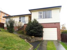 22 Chippendale St Claremont TAS 7011 $235,000 A Family Home with Plenty of Potential The first thing you will notice about this home when you come to view, is the space, the second thing to impress you will be the views! Set high on its block to maximise the stunning river and Mt Wellington views, this large family home will attract a lot of attention. From the formal entry hall you move into the large living area with its own wood burner and reverse cycle air conditioner. There is a large kitchen diner with plenty of room to entertain family and friends. The kitchen itself is quite modern with lots of storage and has large windows overlooking the back yard and beyond the River Derwent. The dining space/family room runs off the kitchen and opens up onto a large sunny deck. This will become your go to place for sunny evenings with a cool drink and those views! There are three large bedrooms, the master with built-in robes, plus a modern family bathroom with separate shower and bath. The property also includes a separate area off the lounge which could be utilised as a study, family dining room or even a fourth bedroom. There is a single car garage under the house plus plenty of off street parking. The backyard is fully enclosed and features a large covered gazebo that would make a great party venue or a very special man cave. With plenty to offer the first home buyer or investor, this property will attract a lot of attention, so make sure you arrange a viewing as soon as possible. Property Snapshot Property Type: House Aspect Views: Mountain & Water Views Construction: Weatherboard House Size: 96.00 m2 Land Area: 635 m2 Features: Air conditioning Decking Dishwasher Distant Views Fenced Back Yard Fully Fenced Yard Lock-up Garage Undercover Entertainment Area Waterview