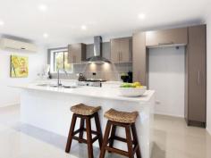 39 Mingaletta Dr Ashmore QLD 4214 $675,000 - $725,000 Seeking a Home with the Wow Factor? Look No Further! No expense has been spared in this amazing renovation, its the little extras that make the extraordinary difference in this gorgeous contemporary residence. Featuring an oversized grand timber door entrance flowing onto a custom built solid timber staircase that leads you into the large air conditioned open plan living area which incorporates indoor/outdoor living effortlessly. Houses of this calibre in this price range have been flying out the door so please don't delay as this beautiful abode will be no different! * Huge mastersuite with full length walk in robe and fully renovated ensuite * Oversized 4th bedroom with high raked ceilings (could be used as a second living area, children's retreat or home office) * Enormous chefs kitchen with stone benchtops, 2pac cupboards, gas cooktop and large breakfast bar * Beautiful second bathroom with freestanding bath, large shower. * Powder room with direct access from outside to avoid water from the pool being walked through the house * Large undercover outdoor area with bar/servery overlooking the in-ground swimming pool * Lots of grassed areas for the children or pets throughout the large 790m2 allotment * Brand new colorbond roof with new insulation and warranty * Double lock up garage with new Pirie electric double door * New LED lighting and ceiling fans throughout