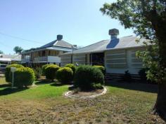 89 Falcon St Longreach QLD 4730 $310,000 They don't Make Them Like This Anymore! Always loved and never loathed has this extremely well maintained Longreach home always been! It comprises of large enclosed wrap around verandahs with stunning high gloss, varnished flooring and french doors leading from two of the bedrooms which feature built in cupboards. Bedrooms three and four are situated on the southern side of the home and are fantastically sized. The carpeted living room adjoins the kitchen which has been updated with neutral tones and includes a walk in pantry. The bathroom includes separate bath and shower and a large linen cupboard directly opposite the hall. An undercover entertaining area to the rear has concrete flooring and the laundry is neatly tucked away behind this in a separate room. Two large trees shade the rear of the home from the afternoon sun and there is established lawns and gardens, older shed / garage and rear lane access