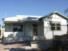 4 Langsford St Port Augusta SA 5700 $240,000 Absolutely Perfect! Property ID: 9580282 I have seen a lot of renovated character homes in my 15 years of real estate and this home would be one of the best! Totally renovation and everything done perfectly. The beautiful polished floors lead to the large living room with open fire place and air conditioning, ultra-modern bathroom with gleaming tiles and quality fixtures and fittings, stunning air conditioned kitchen with Caesar stone bench tops, pantry and dishwasher, 3 good size bedrooms all with ceiling fans, laundry with ample cupboard space and a second toilet and vanity. Outside features extensive paved areas front and back with stepped garden beds all designed for the ultimate low maintenance lifestyle plus a good size shed with auto roller door. Let me just list some more features: Roller shutters to front windows New colour bond roof All new aluminium windows with key locks Poly rain water tank Freshly painted New floorcoverings and blinds New fencing New concrete surrounds All electrical upgrades New hot water service All this and located in a great near CBD street ready for your inspection.
